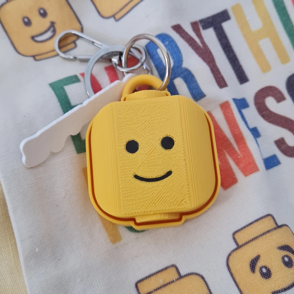 Yellow brick-head fidget clicker keychain